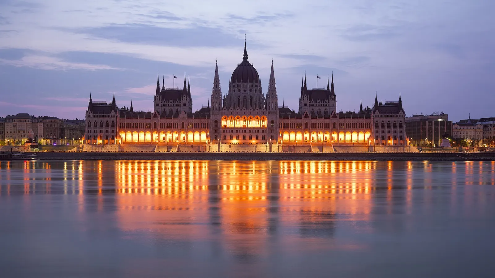 The Hungarian Parliament on the Danube in Budapest at dusk