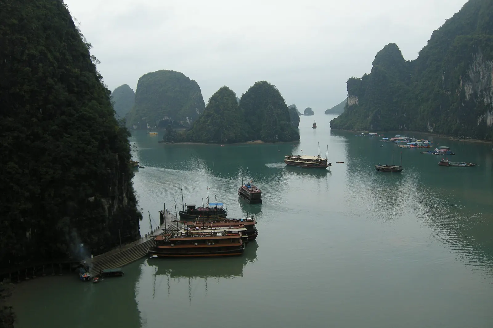 Limestone islands and boats in Ha Long Bay